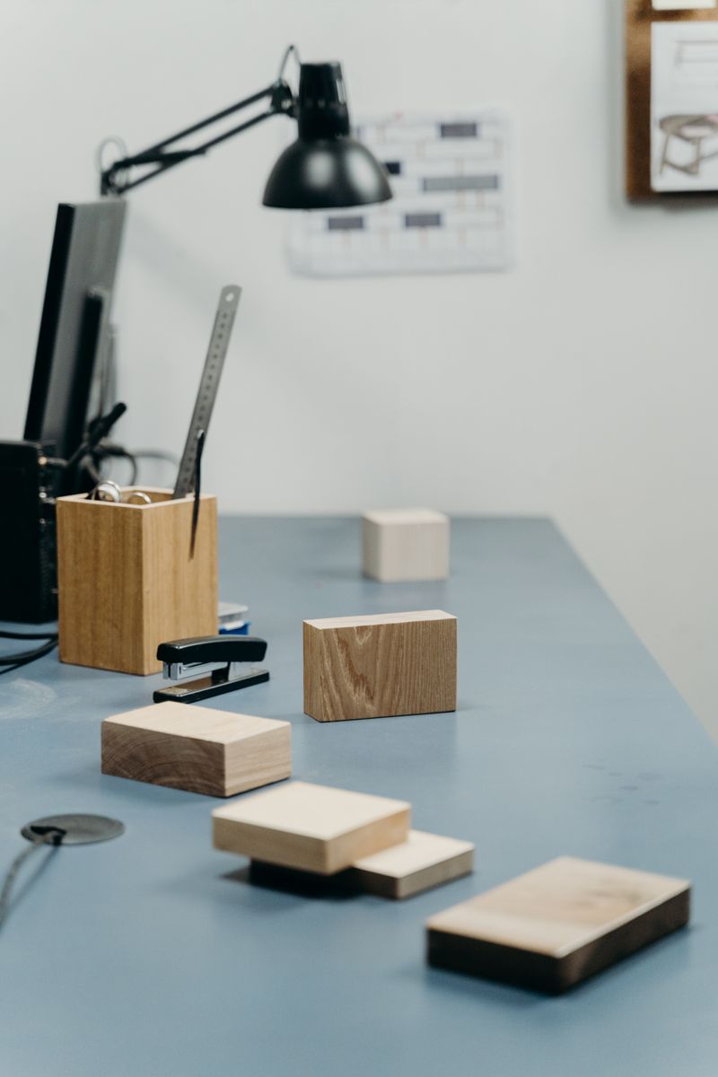 A studio desk with drawings and planning materials
